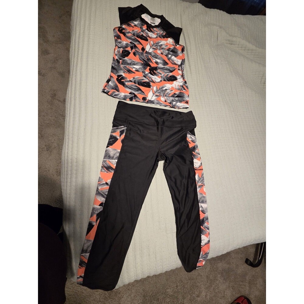 Body Gloves Rash guard Top And Bottom Medium/Large Never Used